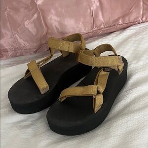 Teva Gold and Black Sandals with Adjustable Straps and Thick Sole